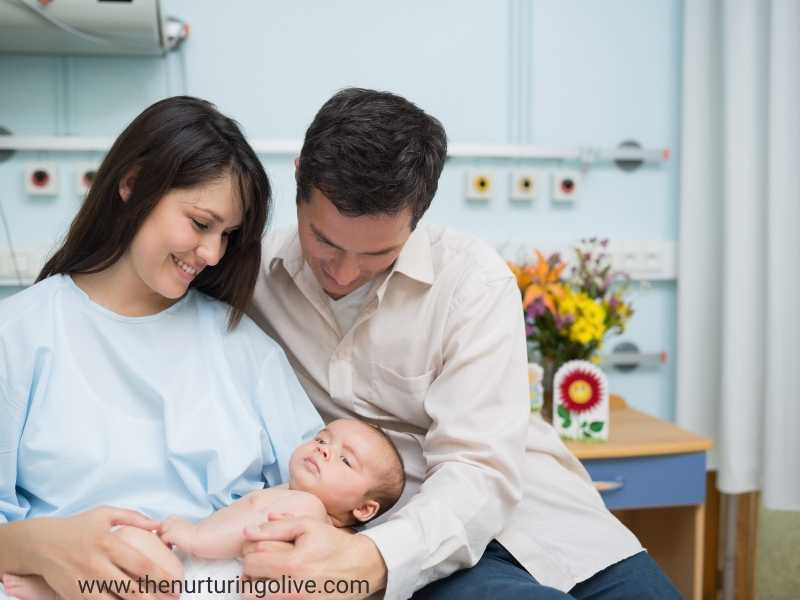 Couple-who knows-how-to-apply-and-receives-the-promise-of-God-in-their-lives-holding-their-new-born-baby-joyfully