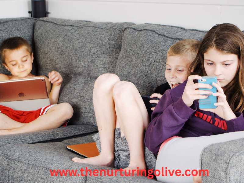 Parenting-in-the-digital-age-children-busy-with-gadgets-on-a-couch