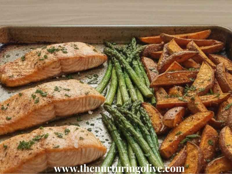 Homemade-sheet-pan-salmon-with-asparagus-and-sweet-potato-wedges-freshly-baked-and-ready-to-serve.