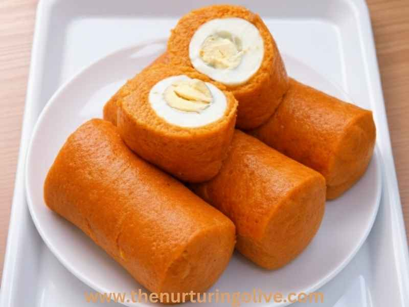very-smooth-moi-moi-made-without-peeling-beans-served-on-a-white-plate-and-tray
