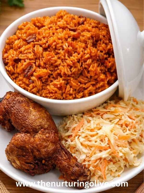 smoky-nigerian-party-jollof-rice-served-with-fried-chicken-and-coleslaw.
