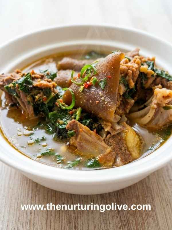 freshly prepared Nigerian pepper soup recipe served hot on a dinner table ready to enjoy
