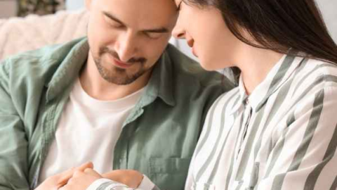 Christian couple praying together to strengthen your marriage spiritually and emotionally